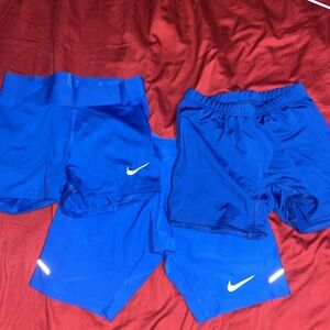 2 size small Nike shorts with an xtra blue small shorts